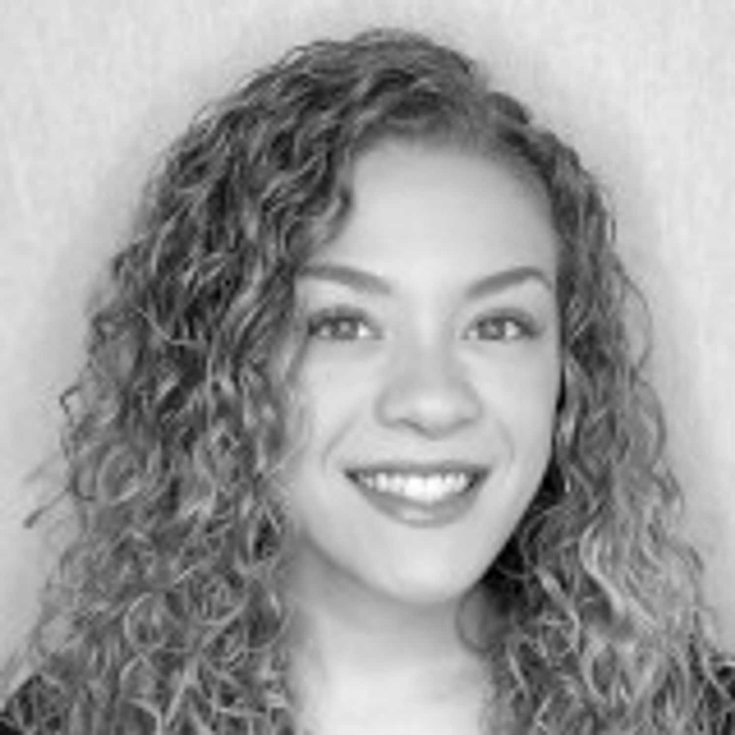 Portrait of Arianna O., a professional stylist at Cameo Salon & Spa, showcasing their expertise and style.