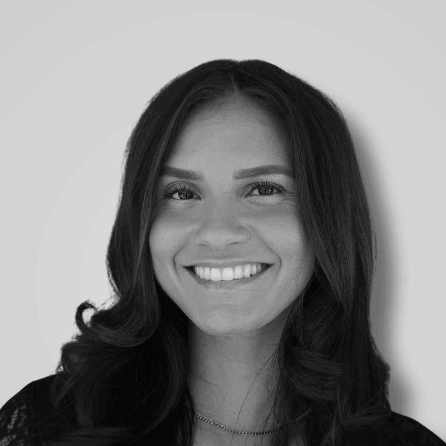 Portrait of Kayla P., a professional stylist at Cameo Salon & Spa, showcasing their expertise and style.