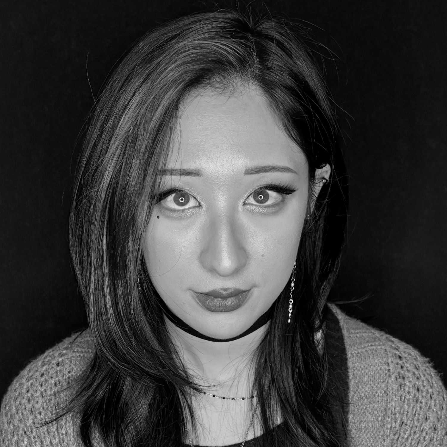 Portrait of Celine R., a professional stylist at Cameo Salon & Spa, showcasing their expertise and style.