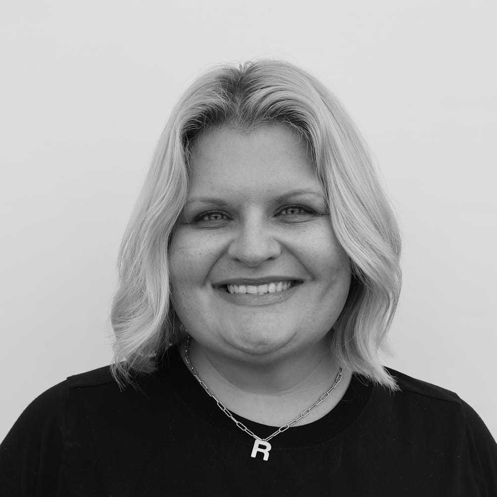 Portrait of Ruthie H., a professional stylist at Cameo Salon & Spa, showcasing their expertise and style.