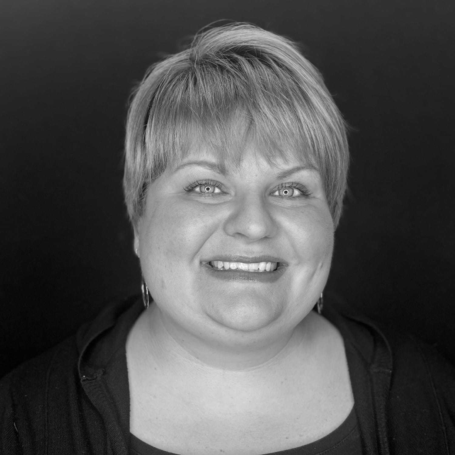 Portrait of Ruthie H., a professional stylist at Cameo Salon & Spa, showcasing their expertise and style.