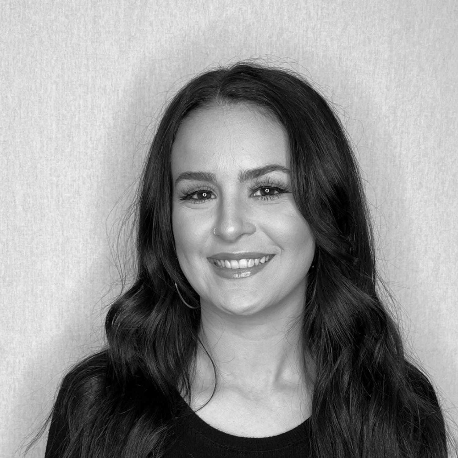 Portrait of Yanessa V., a professional stylist at Cameo Salon & Spa, showcasing their expertise and style.