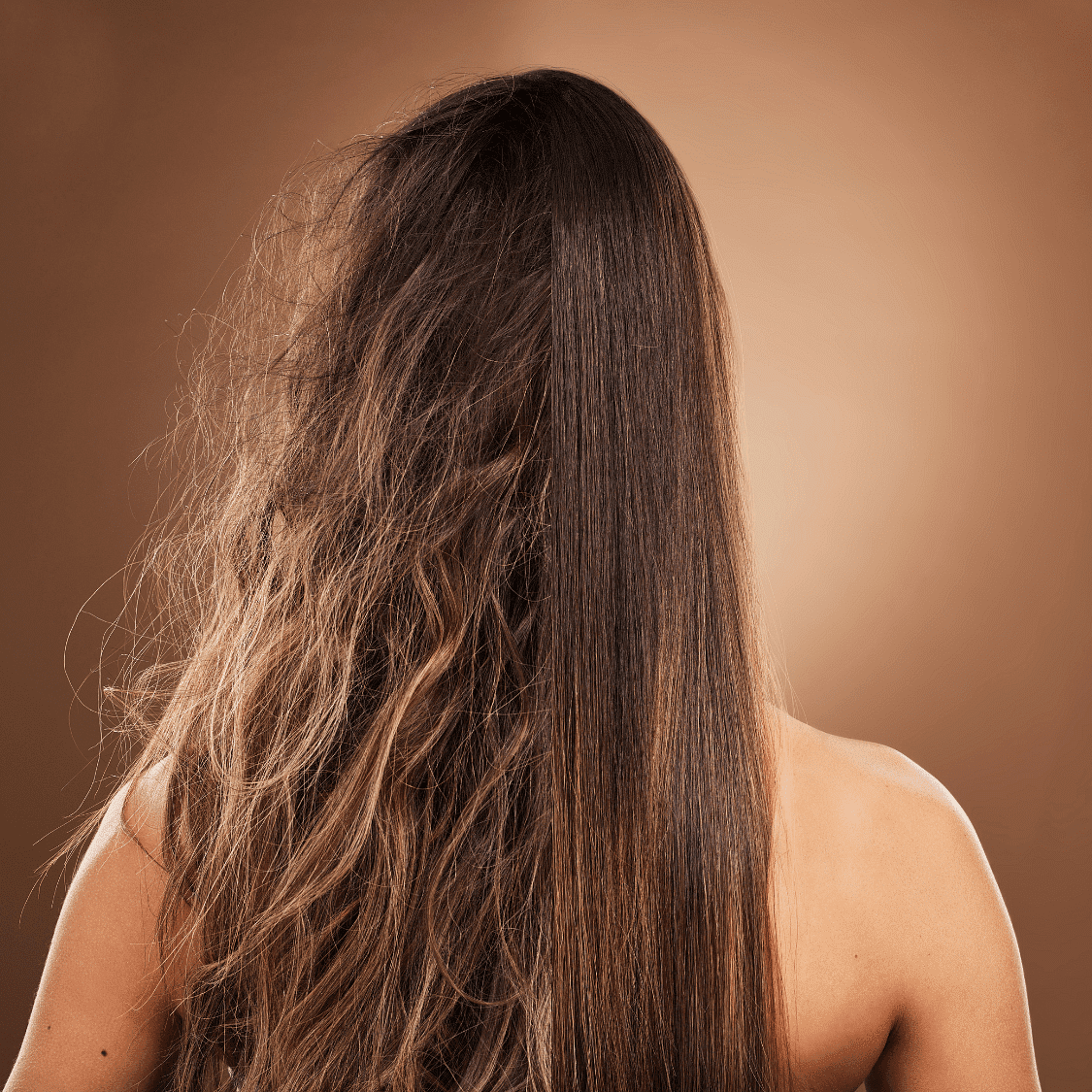 Half frizzy and half smooth hair on a woman's back, highlighting hair treatment results.