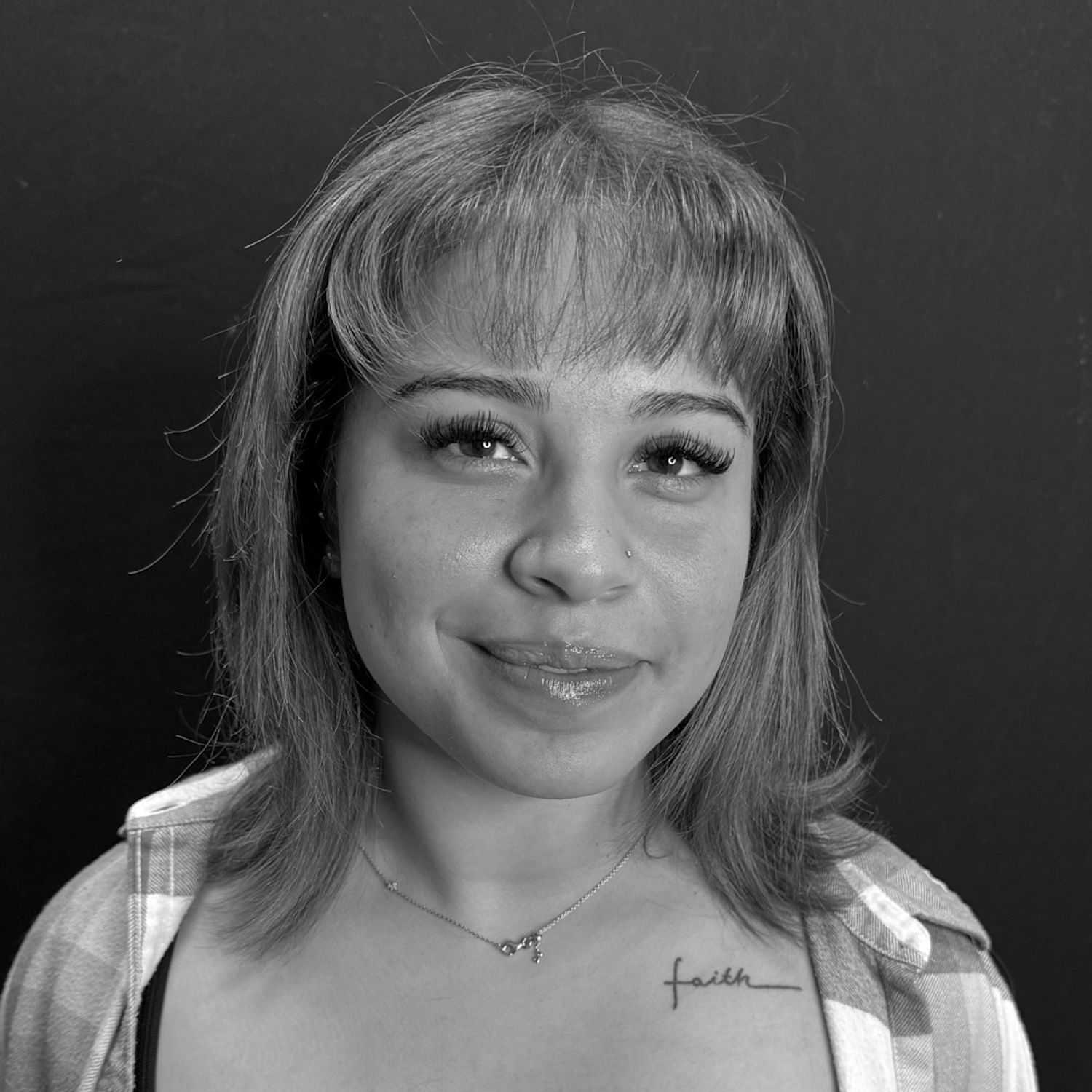 Portrait of Danielle P., a professional stylist at Cameo Salon & Spa, showcasing their expertise and style.