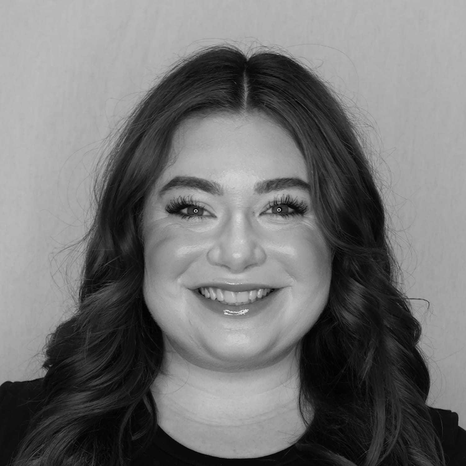 Portrait of Holly B., a professional stylist at Cameo Salon & Spa, showcasing their expertise and style.