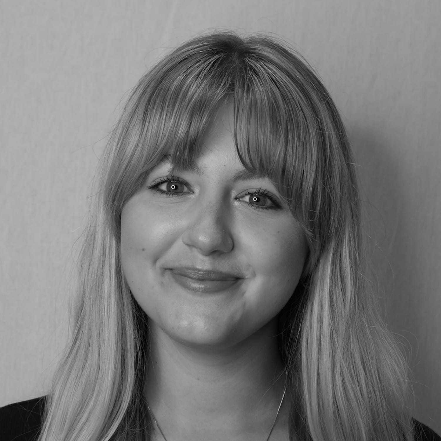 Portrait of Nevaeh W., a professional stylist at Cameo Salon & Spa, showcasing their expertise and style.