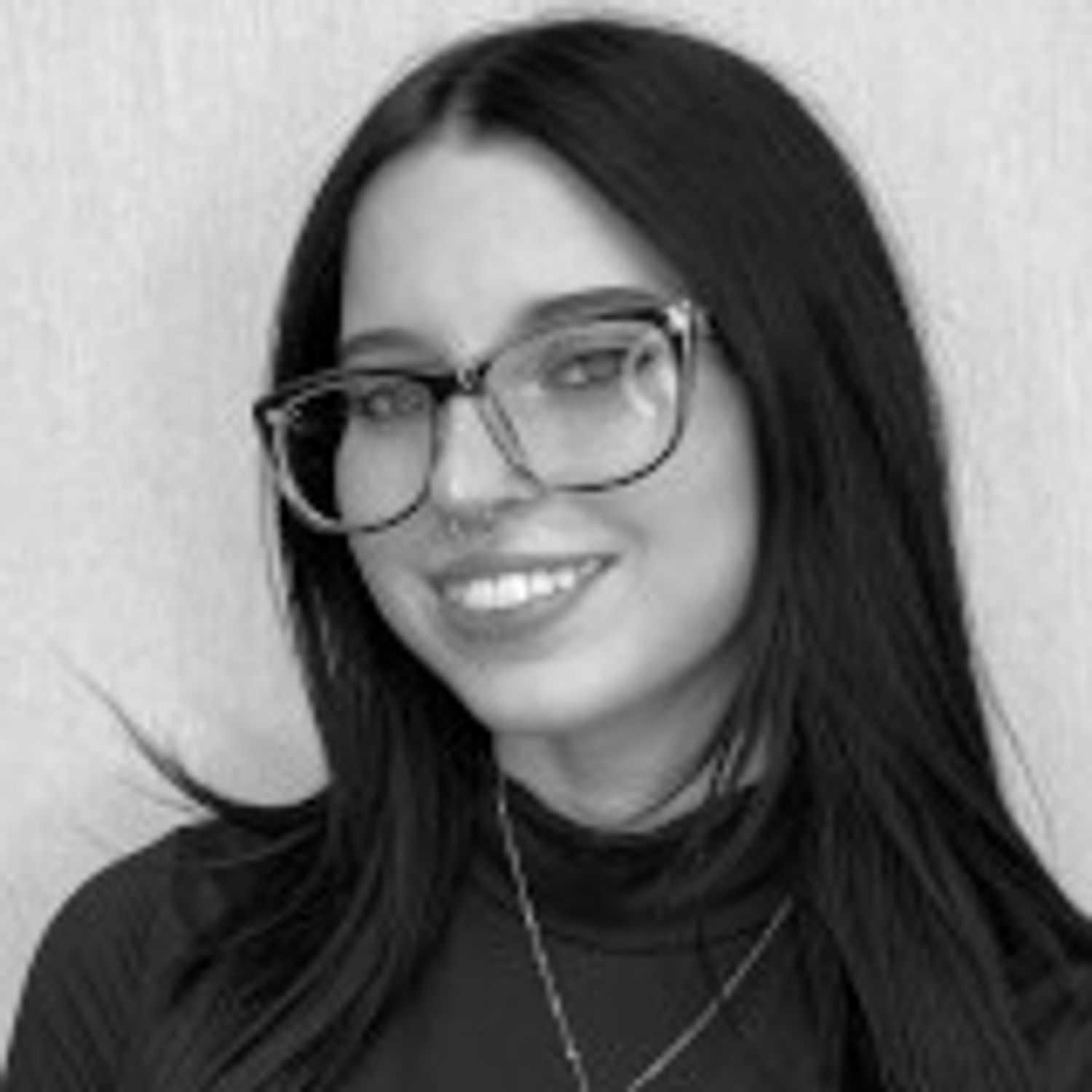 Portrait of Hannah S., a professional stylist at Cameo Salon & Spa, showcasing their expertise and style.