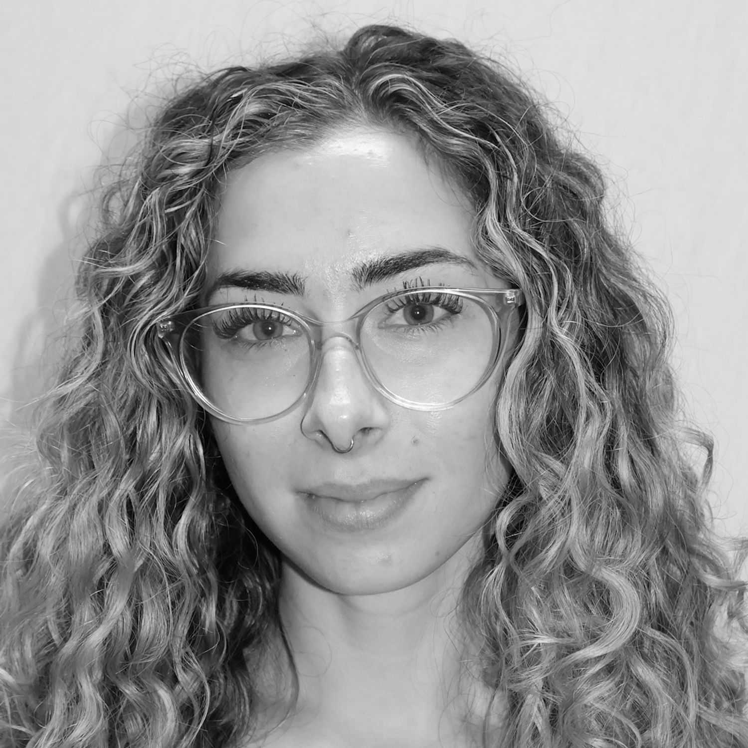 Portrait of Tianna J., a professional stylist at Cameo Salon & Spa, showcasing their expertise and style.