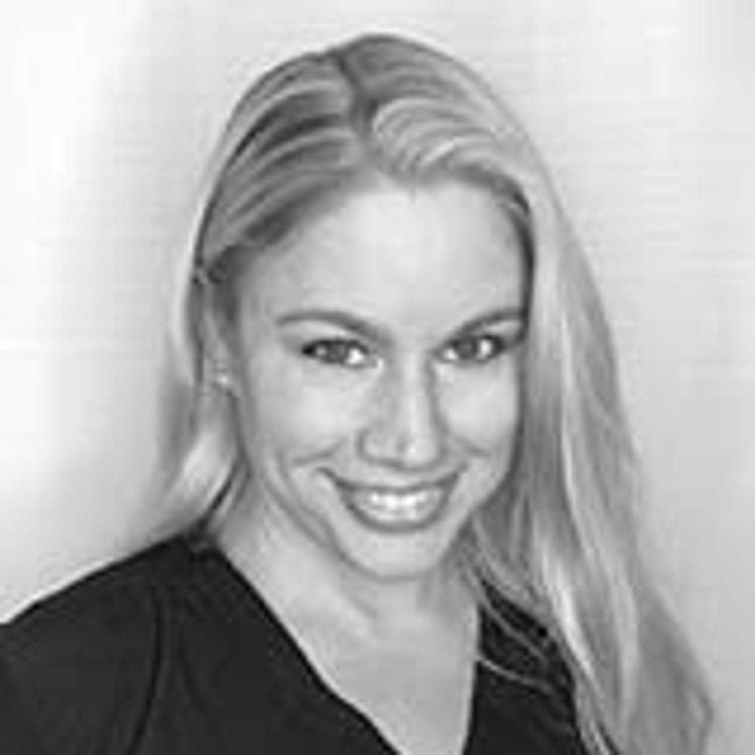 Portrait of Jill T., a professional stylist at Cameo Salon & Spa, showcasing their expertise and style.