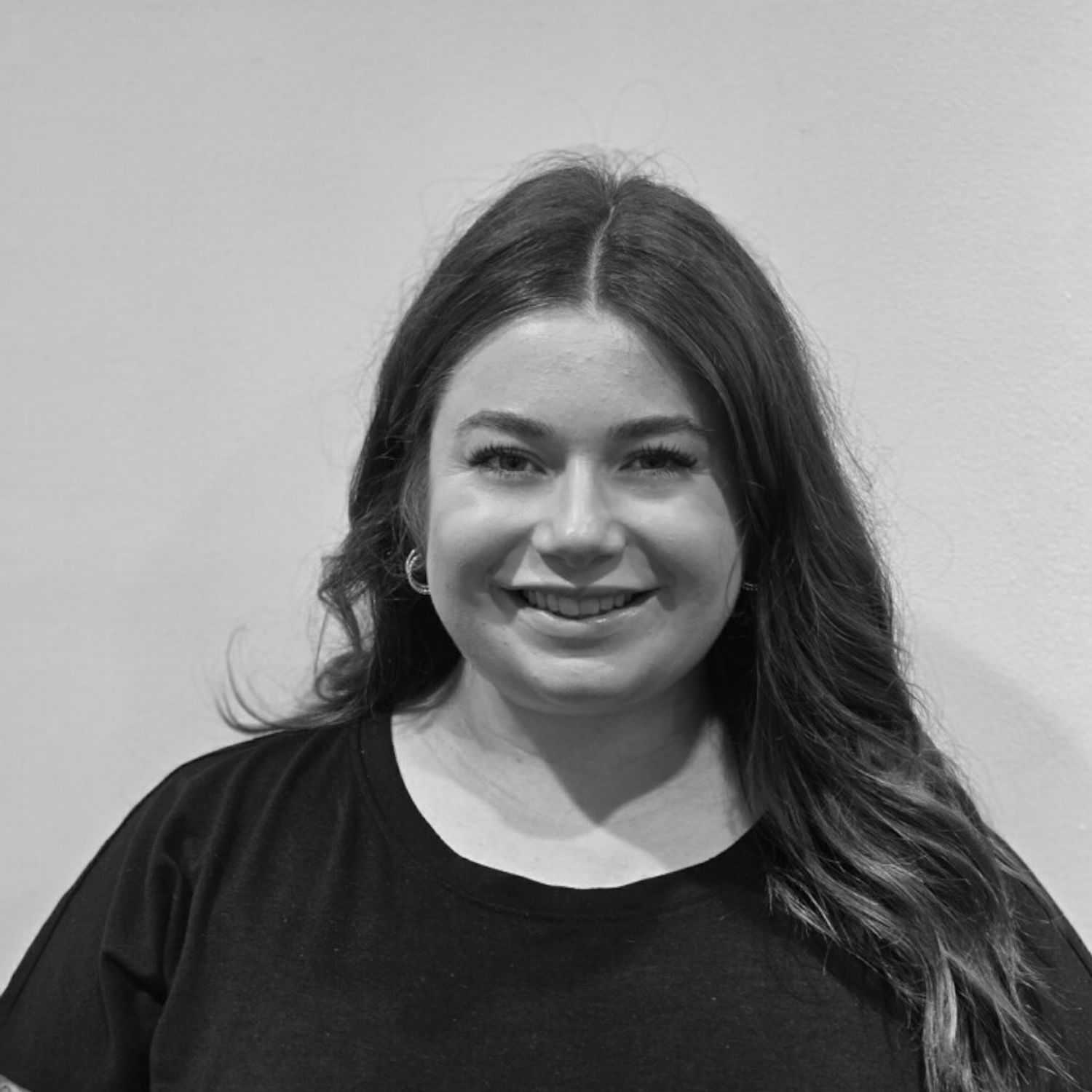 Portrait of Holly B., a professional stylist at Cameo Salon & Spa, showcasing their expertise and style.