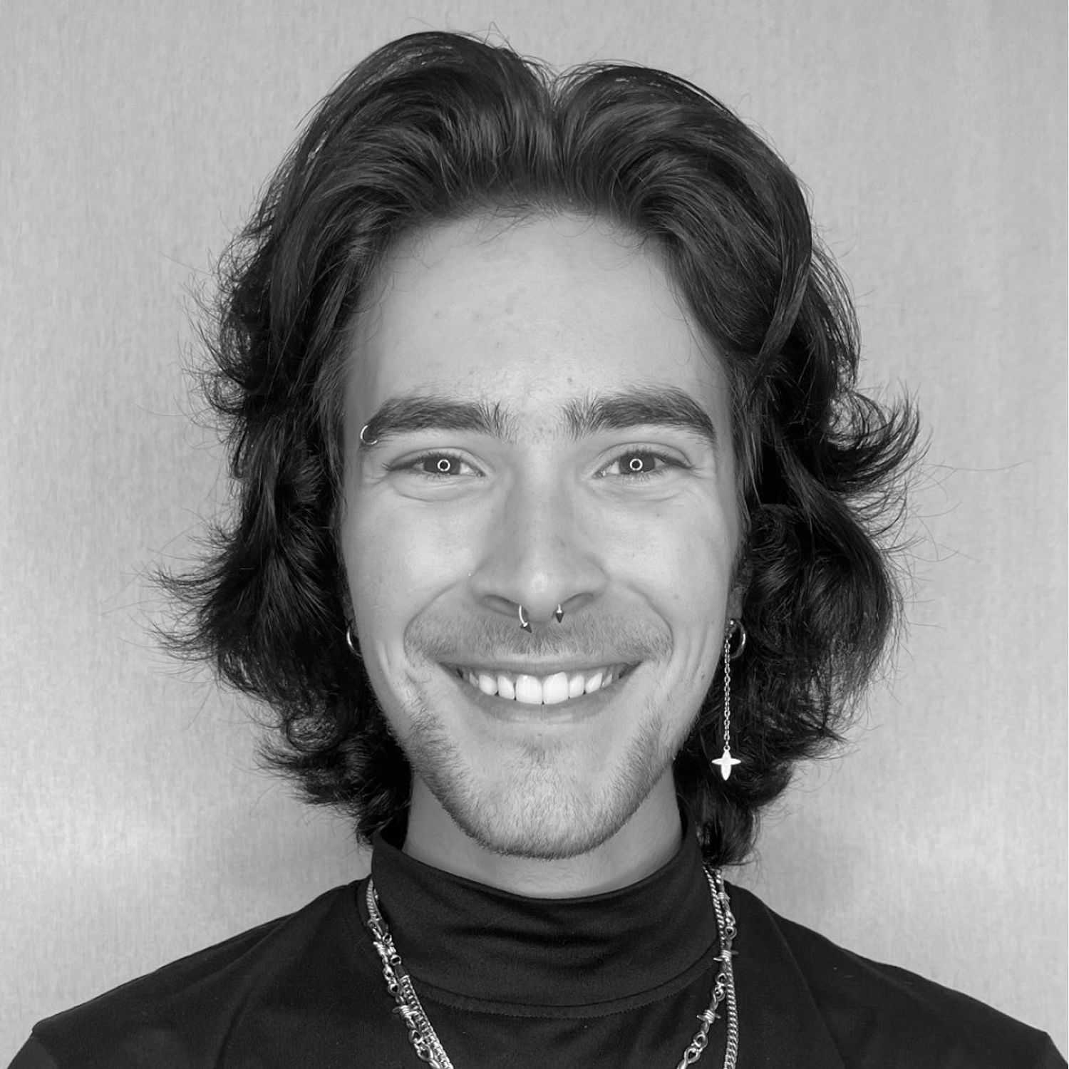 Portrait of Brandon P., a professional stylist at Cameo Salon & Spa, showcasing their expertise and style.