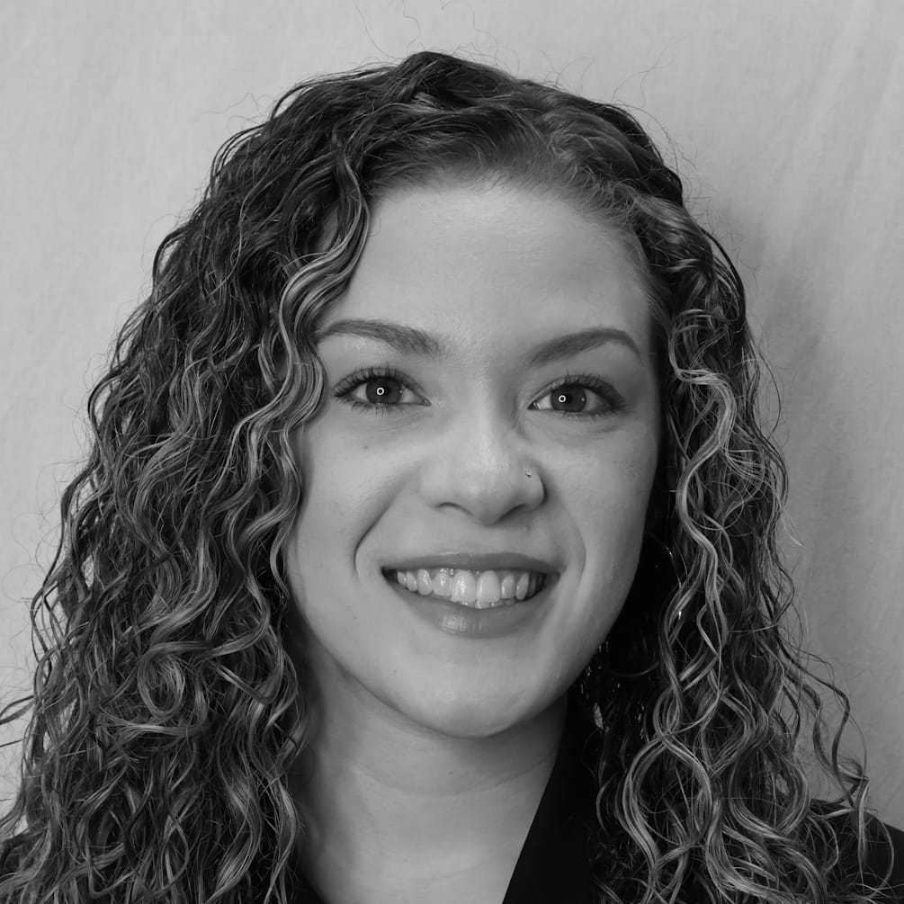 Portrait of Arianna O., a professional stylist at Cameo Salon & Spa, showcasing their expertise and style.